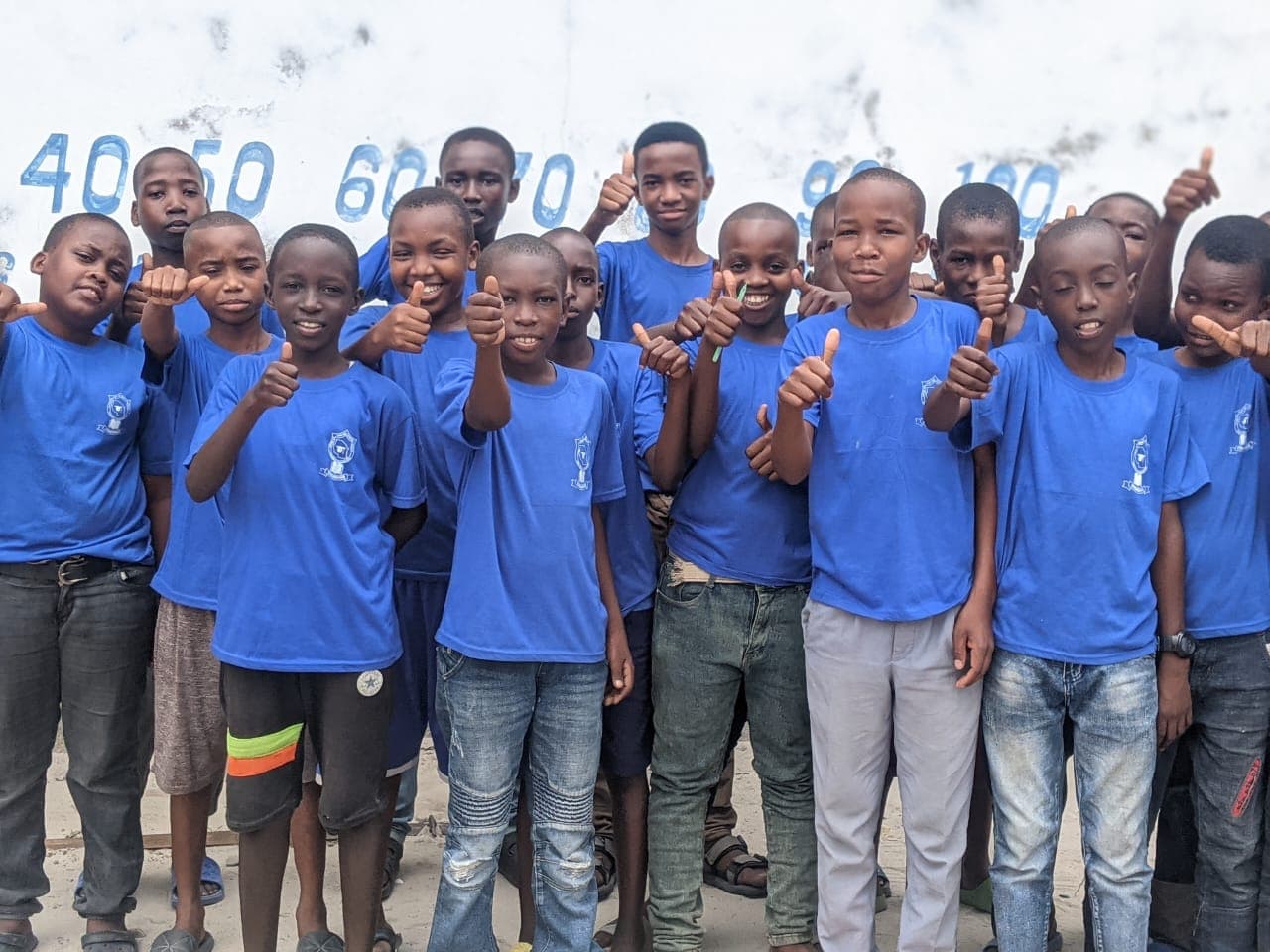 Amosi Schools students showing confidence together
