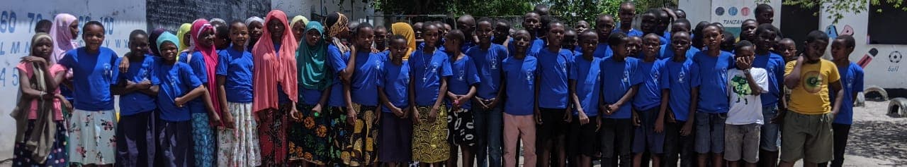 Amosi Schools students gathered together outdoors